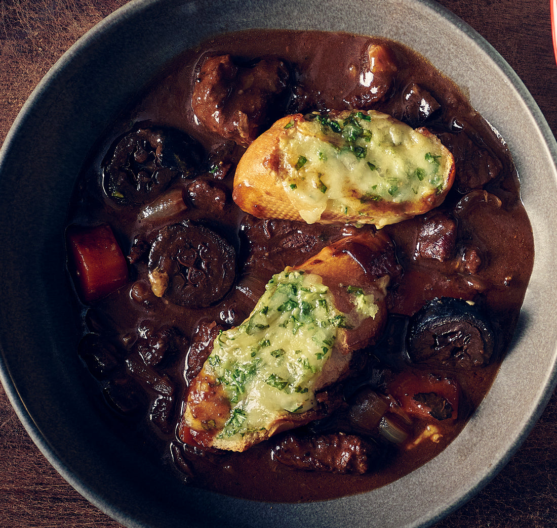 Beef Bourguignon with a Cheesy Garlic Bread Topping