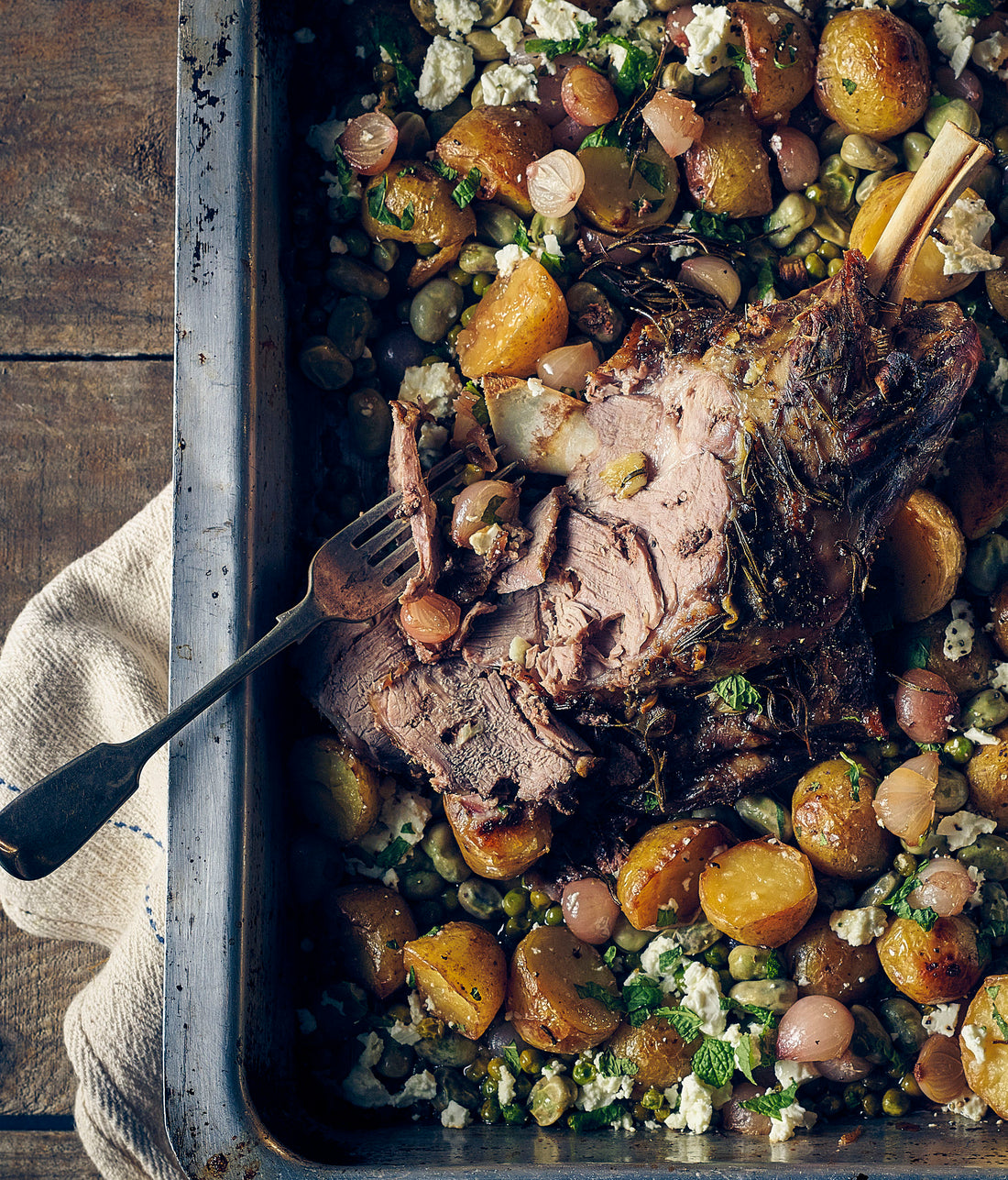 Slow Roasted Lamb Shoulder with Peas and Onions